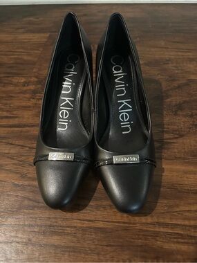 Calvin Klein Black Leather Pointed Pumps with Signature Plaque